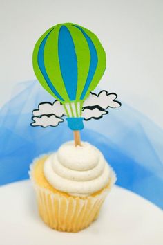 a cupcake with a hot air balloon on top