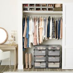 an organized closet with clothes and shoes