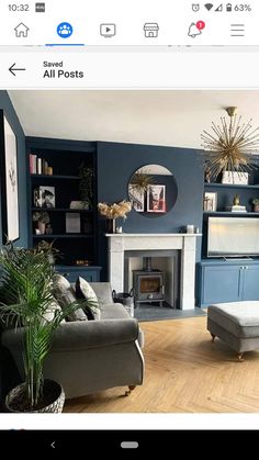 a living room filled with furniture and a fire place