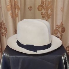 A Rare Find! Classic Handmade Finely Woven Straw Panana Hat From 1920's. Was In Storage All These Years And In Great Condition. Measures 22" On Inner Leather Band. Black Fabric Ribbon On Outside. Needs A New Appreciate Home, Enjoy! White Adjustable Panama Hat For Formal Occasions, White Brimmed Fedora For Kentucky Derby, Classic White Wide Brim Hat, White Brimmed Panama Hat For Formal Occasions, White Flat Brim Fedora For Formal Occasions, White Classic Hat With Curved Brim, Classic White Hat With Curved Brim, White Formal Panama Hat, White Fitted Panama Hat With Curved Brim