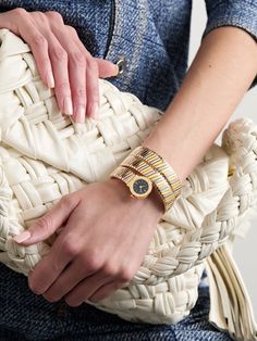 Sourced by Stephanie Windsor, BVLGARI's like-new watch is part of the 'Serpenti' collection - like a snake that sheds its skin, the line has seen many fresh iterations over the past 75 years. Dating back to the '90s, this style has an alternating 18-karat yellow, white and rose gold bracelet that coils around your wrist. The face sits inside a polished dial etched with the brand's moniker. Bvlgari Watch Women Serpenti, Bvlgari Serpenti Watch, Bulgari Serpenti Seduttori Watch, Bulgari Serpenti Watch, Bvlgari Watch, Rose Watch, Swimsuit Jewelry, Bvlgari Serpenti, Antique Gold Snake-shaped Jewelry