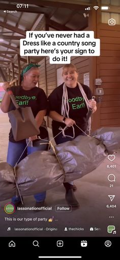 two people standing next to each other in front of a building with bags on their backs