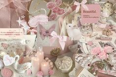 a collage of pink and white items including candles, cards, and other things