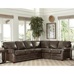 a living room scene with focus on the sectional sofa