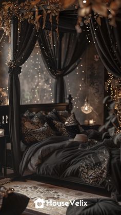 an elegant bedroom decorated in black and gold with string lights on the windowsills