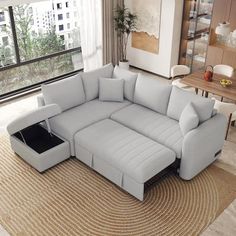 a living room with a large sectional couch