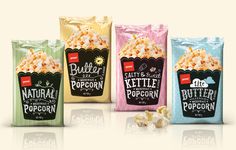 three bags of popcorn are shown in different colors