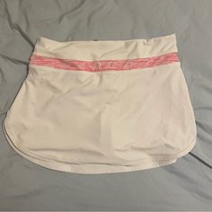 Basically Brand New! White Mini Tennis Skirt With Lining, White Sporty Mini Length Shorts, White Stretch Lined Skort, Sporty White Mini Length Shorts, White Stretch Lined Mini Skirt, White Stretch Skort With Lined Skirt, Sporty White Lined Mini Skirt, White Lined Mini Swim Skirt, White Sporty Skort For Spring