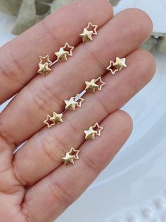 * A B O U T * O U R * S T U D S* 10K GOLD DOUBLE STAR STUD EARRINGS Our solid gold double-star earrings are the cutest way to show your celestial spirit! Tiny, dainty, and simple, they are great everyday earrings. They are hypoallergenic, lightweight, and perfect for sensitive ears. Perfect for any occasion, from casual to elegant.  * D E T A I L S * * 10K Gold * 10K Screw Backs * Dimension: 11mm x 5mm * Stone Shape: Star * Sold as a pair * Hypoallergenic ∙ ∙ ∙ ∙ ∙ ∙ ∙ ∙ ∙ ∙ ∙ ∙ ∙ ∙ ∙ ∙ ∙ ∙ ∙ ∙ ∙ ∙ ∙ ∙ ∙ ∙ ∙ ∙ ∙ * E T S Y * S H O P MORE SOLID GOLD EARRINGS: https://www.etsy.com/shop/livaurajewelry?ref=seller-platform-mcnav ∙ ∙ ∙ ∙ ∙ ∙ ∙ ∙ ∙ ∙ ∙ ∙ ∙ ∙ ∙ ∙ ∙ ∙ ∙ ∙ ∙ ∙ ∙ ∙ ∙ ∙ ∙ ∙ ∙ * S H I P P I N G * T I M E S FREE USA DELIVERY / INTERNATIONAL DELIVERY * USA Standard: 3 - 5 working days * U Celestial Spirit, Star Stud Earrings, Triangle Studs, Solid Gold Earrings, Star Earrings Stud, Star Studs, Everyday Earrings, Screw Back Earrings, Dainty Jewelry