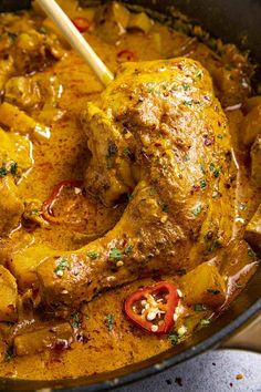 a close up of food in a pan on a table