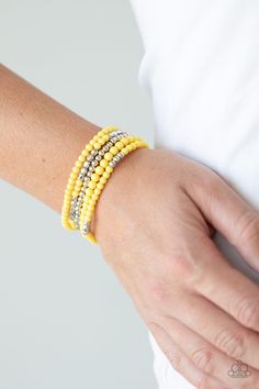 An array of decorative silver, polished yellow, and smooth silver beads are threaded along stretchy bands around the wrist, creating colorful layers.   Sold as one set of five bracelets. Yellow Bracelet, Stacked Jewelry, Paparazzi Accessories, Stretchy Bracelets, Paparazzi Jewelry, Trendy Accessories, One Set, Boutique Jewelry, Necklace Earring Set