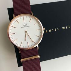 Brand New Daniel Wellington With The Original Box And The Tag. Dw Classic 40mm Bayswater Unisex Watch Dw00100267. Case Size : 40 Mm Case Material : Stainless Steel Case Shape : Round Case Back : Solid Dial Type : Analog Dial Color : White Band Material : Nato Strap Band Color(S) : Ruby Red Water Resistance : 30 Meters / 100 Feet Daniel Wellington Rose Gold, Daniel Wellington Black, Daniel Wellington Petite, Classic Watch Women, Black And Gold Watch, Daniel Wellington Watch, Silver Watches Women, Rose Gold Brown, Red Water