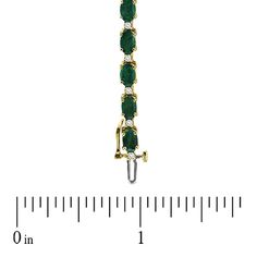 Dress her wrist in glamorous green emeralds and shimmering diamonds. Expertly crafted in warm 14K gold, this traditionally designed bracelet pairs 6.0 x 4.0mm oval-shaped verdant green emeralds with shimmering white diamonds to create a sparkling and colorful garland. An exceptional look, perfect with her most special attire, this bracelet captivates with 3/8 ct. t.w. of diamonds and a polished shine. The 7.0-inch bracelet secures with a durable box clasp. Classic Green Oval Diamond Bracelet, Elegant Green Oval Diamond Bracelet, Luxury Green Oval Tennis Bracelet, Oval Emerald Bracelets For Anniversary, Oval Green Diamond Bracelets, Yellow Gold Oval Bracelets With Diamond Accents, Green Oval Diamond Bracelets, Oval Yellow Gold Bracelets With Diamond Accents, Luxury Green Oval Bracelet