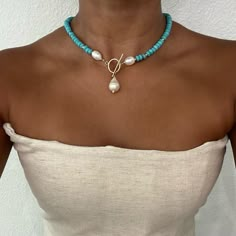 Introducing our exquisite Freshwater Pearl and Turquoise 14K Gold Filled Toggle Necklace! A harmonious fusion of timeless elegance and natural beauty. This captivating necklace brings together the iridescent allure of freshwater pearls and the vibrant charm of turquoise, creating a piece that is both luxurious and enchanting. A stunning necklace that adds a touch of sophistication to any ensemble. https://www.etsy.com/listing/1626236681/turquoise-and-freshwater-pearl-gold Dainty Pearl Necklace, Contemporary Jewelry Design, Toggle Necklace, Gold Filled Necklace, Necklace Turquoise, Pearl Necklaces, Pearl Pendant Necklace, Stunning Necklace, Bijoux Diy