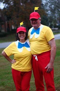 two people dressed up as pokemon and pikachu, one is wearing a red hat