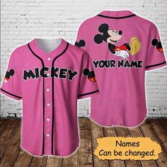 Welcome to the world of magic and charm with our Mickey Mouse Disney Custom Baseball Jersey Shirt! Unleash your inner child and relive the timeless enchantment of Mickey Mouse, the iconic character that has captured hearts for generations. This one-of-a-kind jersey shirt is the perfect blend of fashion, nostalgia, and Disney magic, creating a truly unique and captivating piece for Disney lovers of all ages. Designed with meticulous attention to detail, this baseball jersey shirt showcases the be Mickey Mouse Car, Disney Baseball Jersey, Summer Cotton Mickey Mouse T-shirt, Mickey Mouse Characters, Mickey Mouse Themed Short Sleeve T-shirt, Baseball Fashion, Mickey Mouse Design, Mickey Mouse Cotton T-shirt For Streetwear, Multicolor Mickey Mouse Cotton T-shirt