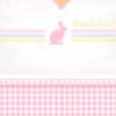 a pink and white checkered table cloth with an orange heart on the top right corner