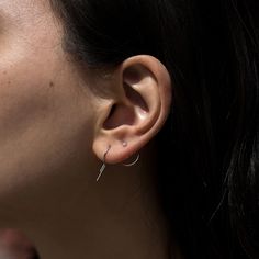 A charming little silver earring, clean and minimalist in design. Sold as singles.See Details for item specifics. White Gold Drop Cartilage Earrings, Modern White Gold Piercings For Everyday, Simple Nickel-free Cartilage Earrings For Everyday, Simple Nickel-free Everyday Cartilage Earrings, Simple Huggie Cartilage Single Earring, Silver Minimalist Plug Earrings For Everyday, Simple Tiny Huggie Earrings For Everyday, Minimalist Silver Plug Earrings For Everyday, Simple Single Huggie Cartilage Earring