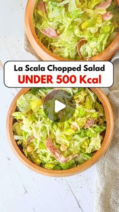 two bowls filled with salad sitting on top of a table