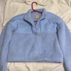 Blue Fuzzy Coat Brand New, Never Worn Cozy Blue Long Sleeve Outerwear, Blue Winter Tops With Pockets, Light Blue Winter Tops With Pockets, Light Blue Cozy Outerwear For Fall, Cozy Blue Outerwear For Spring, Cozy Blue Spring Outerwear, Fuzzy Coat, Teddy Jacket, Color Blue