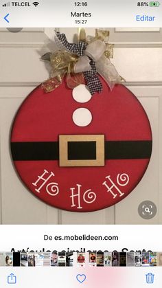 a door hanger with a santa hat on it