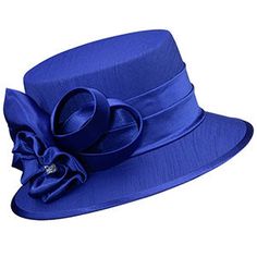 Introducing the exquisite Giovanna HM944-ROY Church Hat, an accessory that promises to accentuate your attire with a touch of elegance and grace. The hat comes in a striking royal blue color, a hue that captures the essence of sophistication and adds a regal touch to your ensemble. Designed with both fashion and function in mind, this hat features a wide brim that gracefully shelters you from the sun's rays. The hat's design is accentuated with a decorative bow and a ribbon, carefully placed to Church Hat, Sophisticated Outfits, Decorative Bows, Church Hats, Royal Blue Color, Structure Design, Blue Tones, Wide Brimmed, Hat Designs