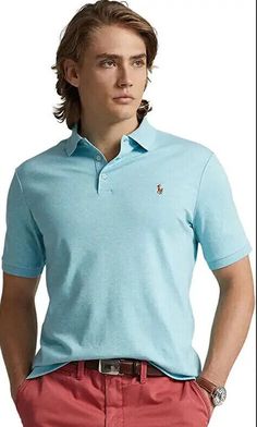 From Polo Ralph Lauren, this polo shirt features: Ribbed polo collar Short sleeves with ribbed armbands 3-button placket Multicolored signature embroidered pony at the left chest Even vented hem Classic fit  Pullover construction  Cotton Machine wash; tumble dry Fitted Light Blue Short Sleeve Polo Shirt, Blue Casual Polo Shirt With Ribbed Collar, Fitted Light Blue Polo Shirt With Polo Collar, Light Blue Fitted Polo Shirt With Polo Collar, Casual Blue Polo Shirt With Ribbed Collar, Fitted Light Blue Polo Shirt, Fitted Blue Polo Sweater With Short Sleeves, Fitted Short Sleeve Blue Polo Sweater, Fitted Blue Short Sleeve Polo Sweater