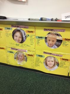 a bulletin board with pictures of children's faces on it in an office cubicle