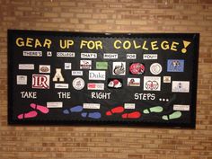 a bulletin board with stickers on it that says gear up for college and features foot prints