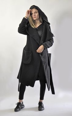 "Black Wool Coat, Hooded Coat, Winter Wool Coat Autumn-winter casual coat. Wool hooded maxi coat. Oversized comfortable coat. Black coat , warm and cozy. The coat has a luxury viscose lining. Model wearing size S. MODEL SIZE bust: 89 cm (34\") waist: 65 cm (25\") Hips: 89 (34\") height:176 cm Care Only Dry Cleaning Shop sizing chart GABYGA SIZE XXS (US 0, UK 4, Italian 34, French 32, German 30, Japan 1) bust: fits bust around 32.5\" / 81cm Waist: fits waist around 25\" / 63.5cm Hips: fits hips a Black Wool Coat With Pockets For Winter, Black Wool Coat With Pockets For Cold Weather, Oversized Black Wool Coat For Winter, Black Hooded Wool Coat For Winter, Black Wool Coat With Shawl Collar For Winter, Black Wool Long Sweater Coat, Black Sweater Coat With Pockets For Cold Weather, Black Wool Hooded Outerwear, Black Hooded Sweater Coat For Fall