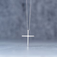 Minimal solid gold handmade cross necklace, unisex cross, great for men and women alike. Available in 14k yellow and 14k white gold, please make your choice from the drop down menu. This pendant has a shiny/polished finish. Size: 1,9 cm / 0.8 inches long and 1.5cm / 0,6 inches wide Material: 14k solid yellow gold, 14k solid white gold You can choose the charm with a 14k solid gold chain or without a chain. Perfect Birthday gift, Baptism gift or for any other special occasion. Comes in gift box. Minimalist Cross Pendant Jewelry Gift, Minimalist Yellow Gold Cross Necklace, Minimalist Cross Pendant Necklace As Gift, Minimalist Yellow Gold Cross Necklace Gift, Minimalist Cross Pendant Necklace For Everyday Wear, Minimalist Cross Pendant Necklace For Everyday, Simple Cross Jewelry For Gifts, Minimalist Crucifix Necklace As A Gift, Classic Cross Necklaces For Gifts