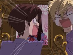 two anime characters looking at each other in front of a mirror with their mouths open