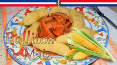 a plate with corn, tomatoes and other food on it that says boillios de mair