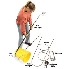 a woman is cleaning the floor with a yellow bucket and two hoses attached to it