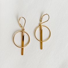 Circle & Bar Drop Earrings Gold Modern Gold Round Wrap Earrings, Gold Round Linear Earrings, Modern Handmade Open Circle Earrings, Modern Gold Drop Clip-on Earrings, Elegant Round Linear Brass Earrings, Circle Bar