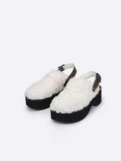 Editor's NotesSCOMBER presents a chunky clog with fuzzy upper fabric. It goes well with casual outfits.- Clog style- Fuzzy fabric- Buckle strap- Chunky outsole- Trendy and cozy mood Measurements(in.)- Size: KR 225MM (US 5.5) ~ KR 255MM (US 8.5)- Heel: 2.76 in.- Weight: 1.26 lbs (KR 240MM)*Fit true to size Composition & Care- Material: Upper: Cow Skin / Inner: Artificial Leather- Natural leather may have fine scratches and wrinkles- Bright leather can get stained by denim or dark ou White Round Toe Clogs For Winter, Comfortable White Winter Clogs, Cozy Mood, Fuzzy Fabric, Clog Style, Clogs Style, Platform Clogs, Cow Skin, Artificial Leather