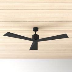 a ceiling fan mounted to the side of a wooden ceiling in a room with wood slats