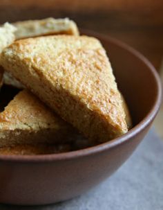 three pieces of bread in a brown bowl