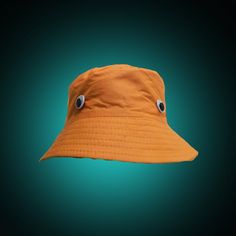 It's got f-n googly eyes on it... 👀 Googly Eyes Bucket Hat, perfect for chillin' , partying, festivals, pretending to be a sasquatch 🌴 Eyes secured through the hat so they wont fall off, no matter what you get up to... SAME HATS, NEW LISTING. Check shop reviews :) Reg - 58cm Large - 60cm Bstock have small stiching errors. sassy the sasquatch bucket hat Playful Adjustable Orange Hat, Playful Adjustable Hats For Halloween, Playful Adjustable Halloween Hats, One Size Fits Most Halloween Hat For Outdoor, One Size Fits Most Halloween Outdoor Hat, Adjustable Novelty Hats One Size, Fun Brimmed Halloween Hats, Quirky Adjustable Cap, Adjustable Novelty Mini Bucket Hat