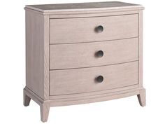 a white dresser with three drawers and two knobs on the bottom drawer, in front of a white background