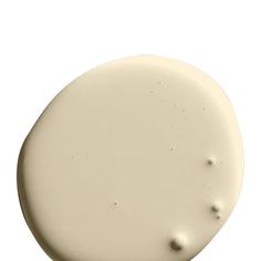 a white round object with small holes in the center on a white background that appears to be paint or acrylic