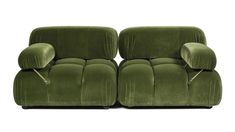 two green couches sitting next to each other on a white surface with no one in it