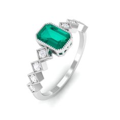 Product Details Intricate with Beaded Gold, this Emerald Engagement Ring has an absolute charm. The Octagon shape of Emerald Solitaire along with diamond Side Stones makes it an alluring piece of fine jewelry. This Solitaire Side Stone Ring will be a perfect fit your significant other. Product Information SKU SHP-RINGS082212761 Weight 1.68 gm (Approximate) EMERALD INFORMATION No.of Stones 1 Pieces Total Weight 0.66 Carat (Approximate) Dimension(approx) Emerald Cut-4X6 mm-1 Pcs Color Green Cut Br Side Stone Ring, Octagon Shape, Ring With Diamond, Emerald Engagement, Emerald Engagement Ring, Significant Other, Stone Ring, Bezel Setting, Emerald Cut