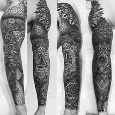 black and white photo of a man's leg with intricate tattoos on his legs