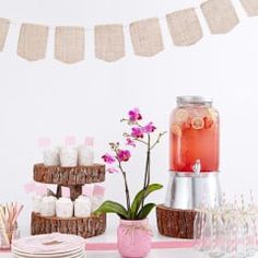 a table topped with lots of desserts and drinks