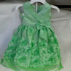 Here Is A Super Baby Dress. Size 18 Months. There Is A Pair Of Panties That Come With It. There Is Ruffled Flowers All Over It. Green Summer Dress For Baptism, Green Summer Baptism Dress, Green Ruffled Dress For First Birthday, Green Fitted Dress For First Birthday, Fitted Green Dress For Baptism, Cute Green Dress For First Birthday, Baby Green, Ruffle Flower, Baby Dresses