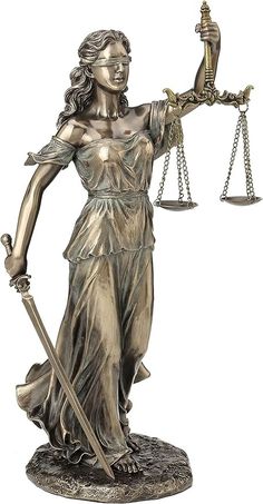 a statue of lady justice holding the scales of justice