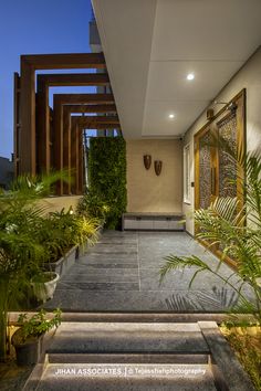 an outdoor area with stairs and plants