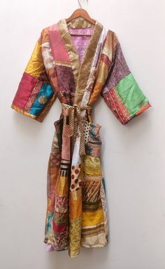 ilk Kimono Women Robe Dressing Gown Beach Wear Gown Patchwork Kimono Vintage Sari Kimono Indian Recycled Ethnic Night Wear Robes This gown is luxury Indian Silk, a beautiful soft, elegant and sensual fabric, which drapes beautifully over the body. These robes are the perfect present for a loved one or for yourself. The fabric is so luxurious and beautiful. Great to wear around the house or to dress up with jewellery or with some jeans & a t-shirt to go out. NOTE : This is vintage patchwork item. Bridesmaid Bathrobe, Bohemian Robes, Silk Bathrobe, Flowy Gown, Luxury Lounge, Patchwork Kimono, Kind Photo, Bridal Kimono, Silk Dressing Gown