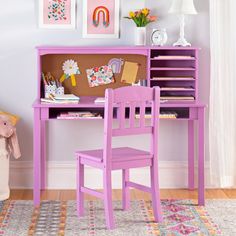 a child's desk and chair in a room